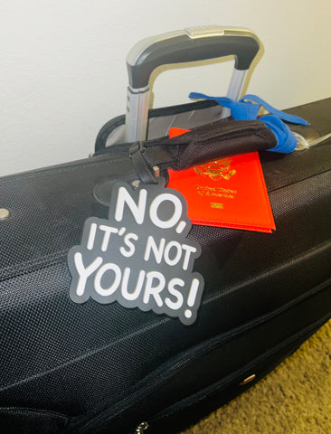 NO ITS NOT YOURS! Luggage tag