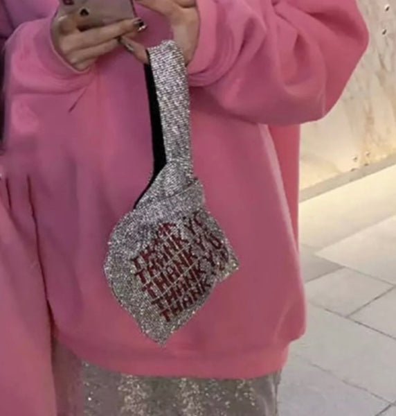 Rip me out the Rhinestone Bag