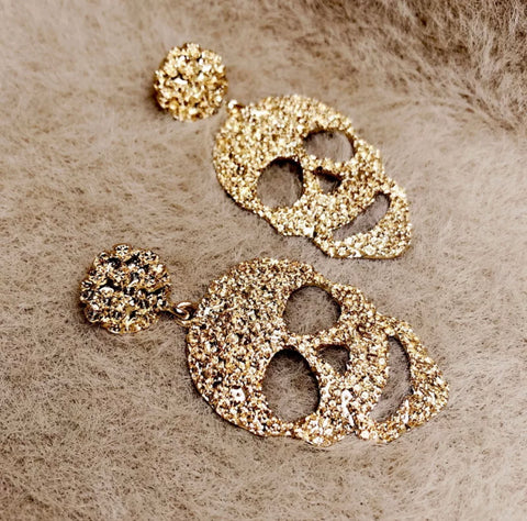 Gold skull textured earrings